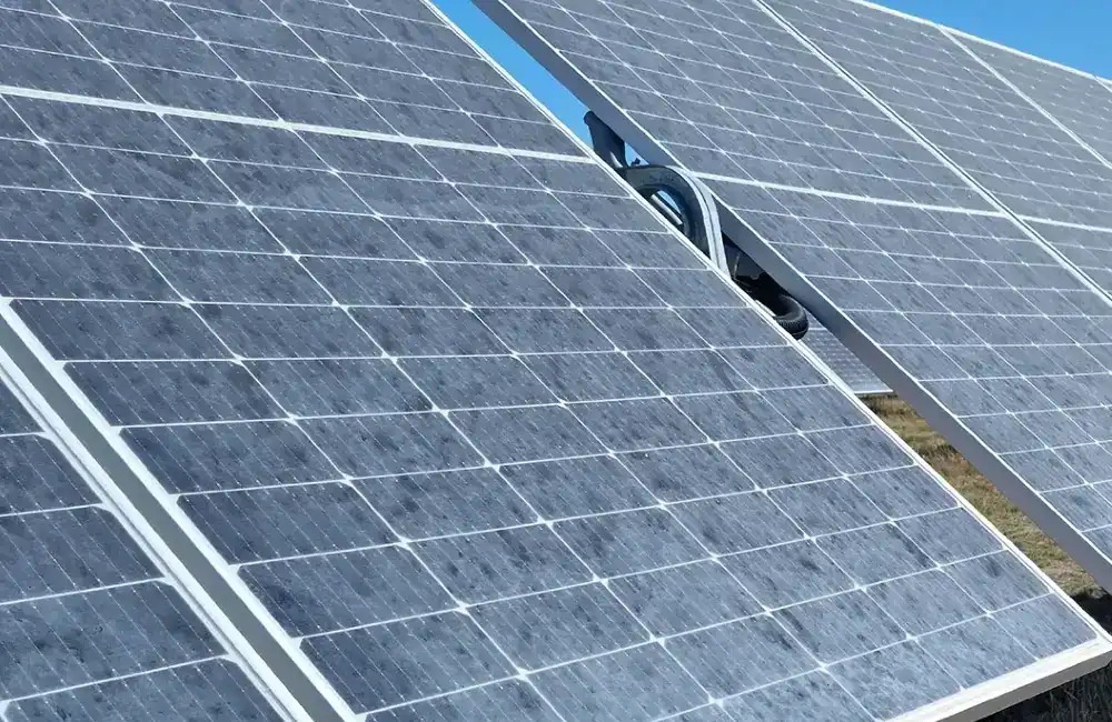 Solar panel heavily covered in dust and dirt in a dry Namibian environment reducing solar energy production efficiency