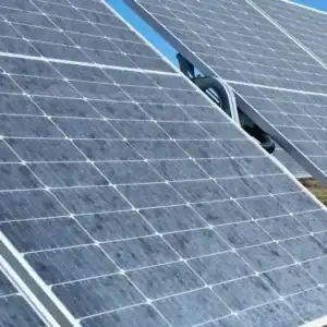 Solar panel heavily covered in dust and dirt in a dry Namibian environment reducing solar energy production efficiency
